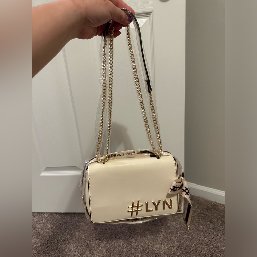 Lyn Brand crossbody Bag new with tag cream color